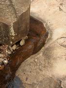 More water flowing around rocks