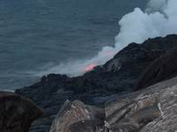 lava flowing into the ocean