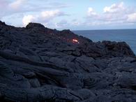 Glowing lava near the cliffs